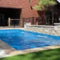 Elegant Fiberglass Pool with Stone Waterfall