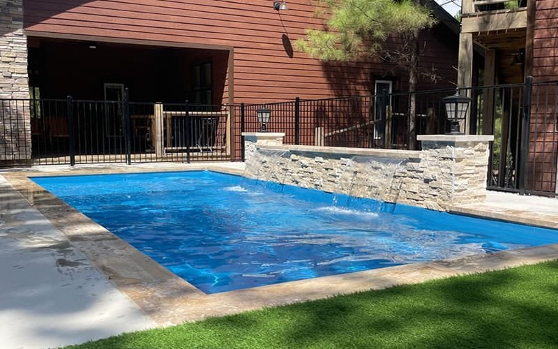 Elegant Fiberglass Pool with Stone Waterfall
